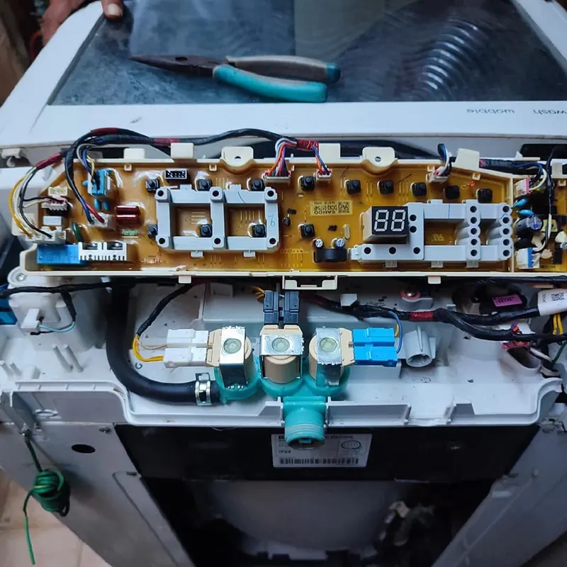 Top-load washing machine control board and water inlet valves