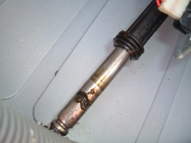Washing machine shock absorber (damper) mounted under the drum
